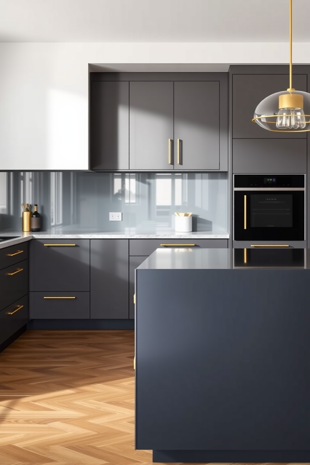 A modern kitchen featuring a dark gray island with sleek gold accents. The cabinetry is a complementary shade of light gray, creating a sophisticated contrast throughout the space.