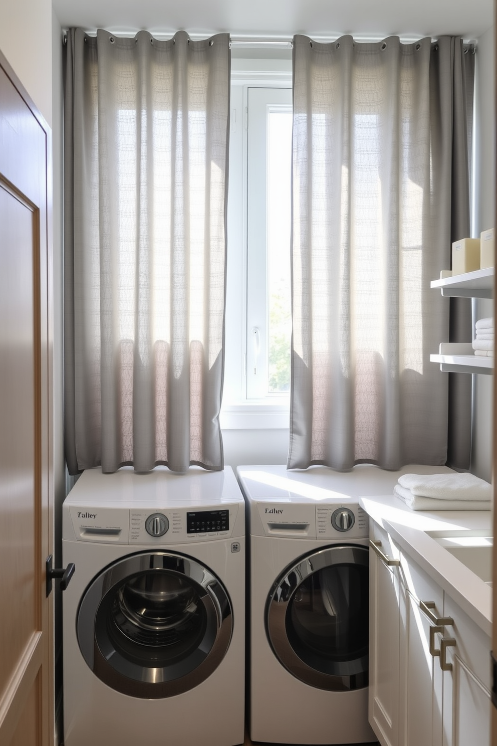 A stylish laundry room featuring gray curtains that allow soft natural light to filter in. The space includes a modern washer and dryer set with sleek cabinetry and a spacious countertop for folding clothes.