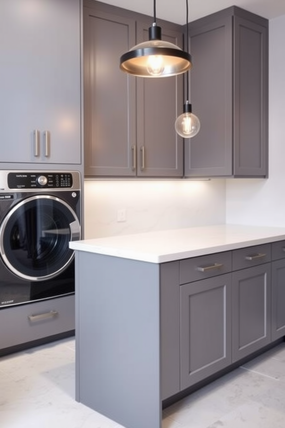 A stylish laundry room featuring herringbone tile flooring in dark gray. The walls are painted in a soft white, creating a modern and clean aesthetic.