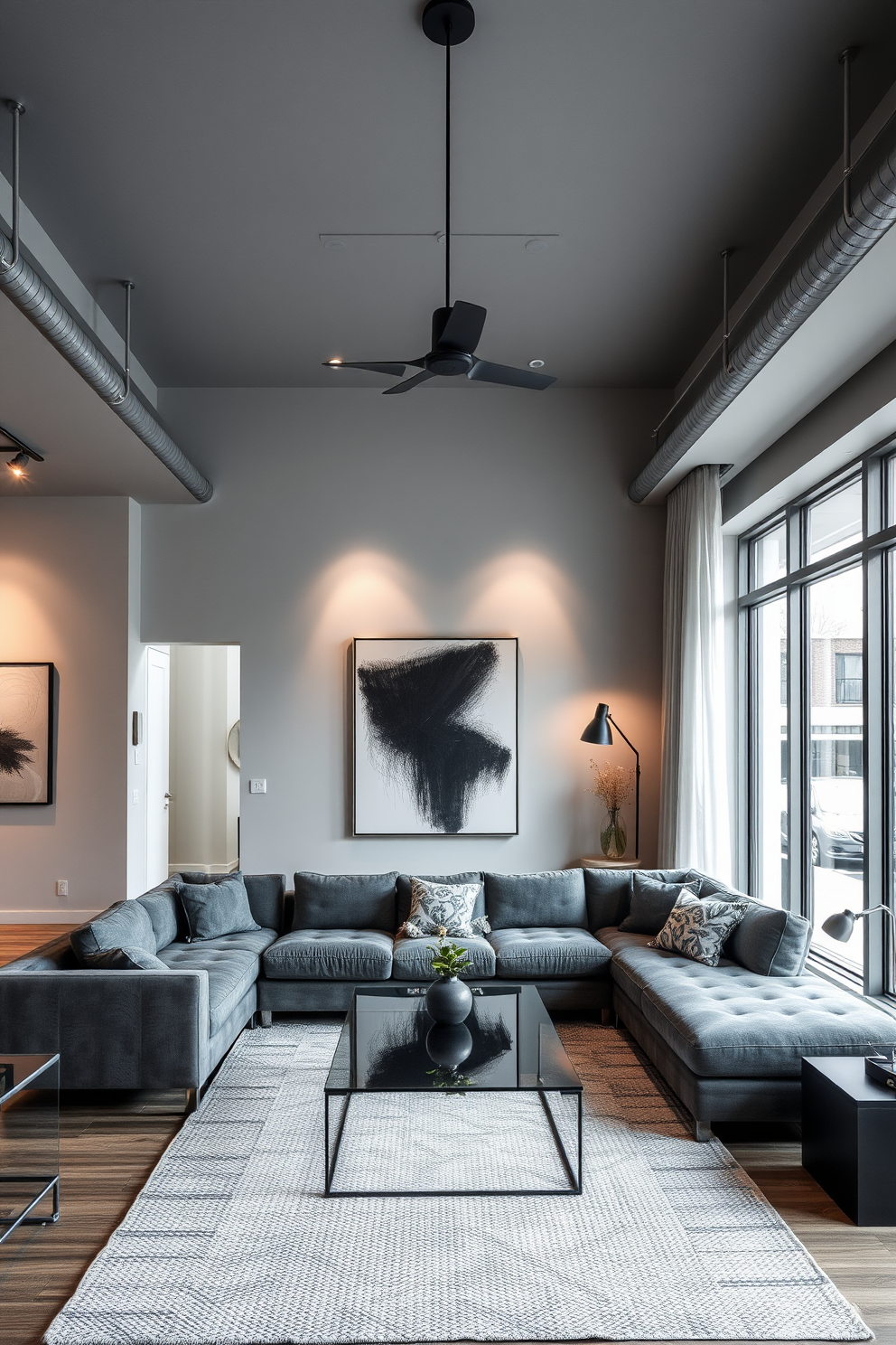 A modern gray living room featuring industrial gray lighting fixtures that enhance the contemporary aesthetic. The space includes a plush gray sectional sofa paired with a sleek glass coffee table and a textured area rug beneath. The walls are adorned with minimalist artwork, creating a striking contrast against the gray tones. Large windows allow natural light to flood the room, complemented by strategically placed accent lighting for an inviting ambiance.