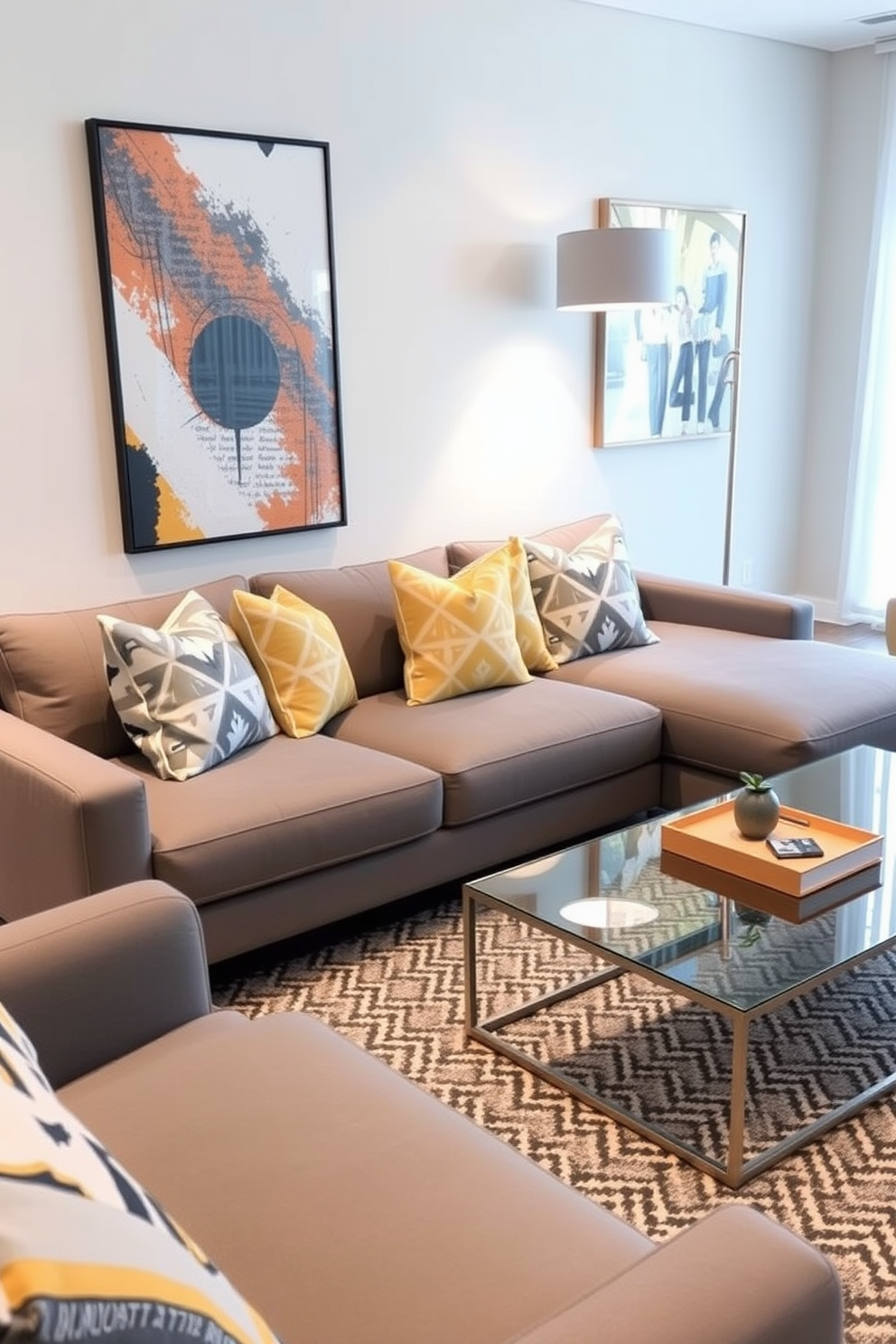 A chic living room featuring a gray leather sofa positioned centrally against a wall with soft ambient lighting. The room is accessorized with a sleek glass coffee table and decorative throw pillows in varying textures and shades of gray.