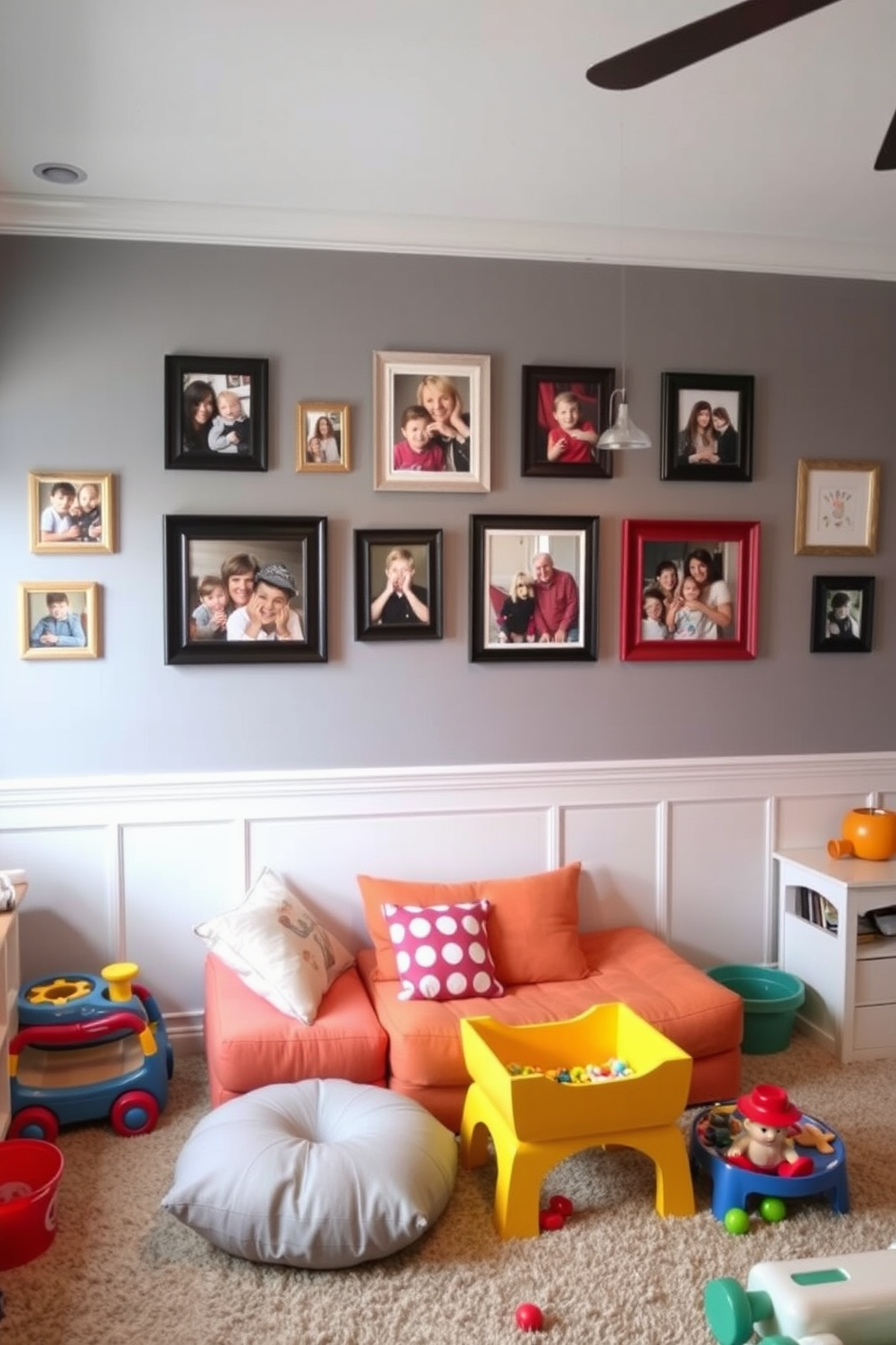 A playful playroom featuring a gray accent wall adorned with family photos in various frames. The room is filled with colorful toys and soft seating options, creating a warm and inviting atmosphere for children.