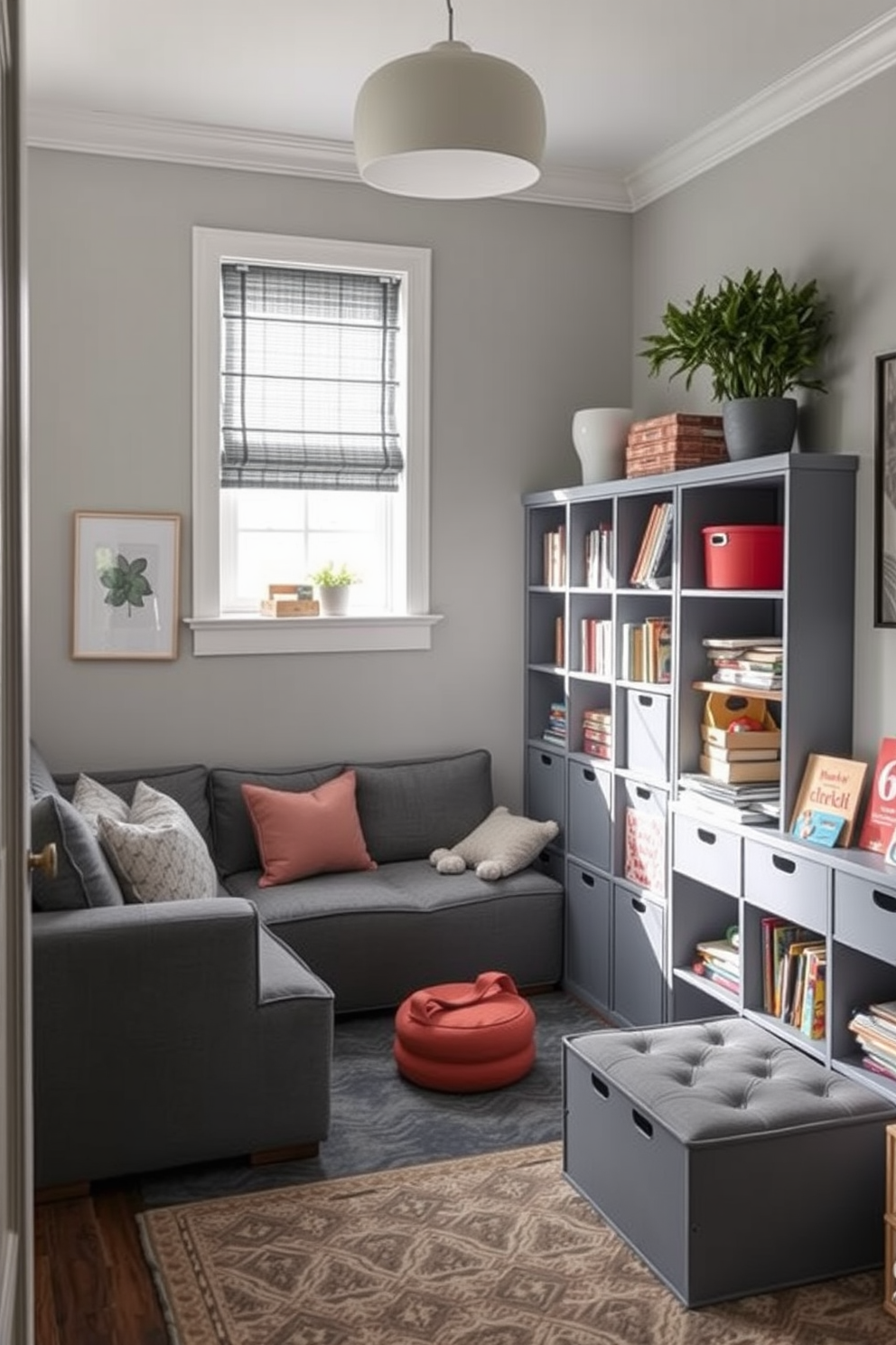 A cozy playroom designed for small spaces featuring functional gray furniture. The room includes a modular gray sofa that can be rearranged easily and a compact gray storage unit filled with toys and books.