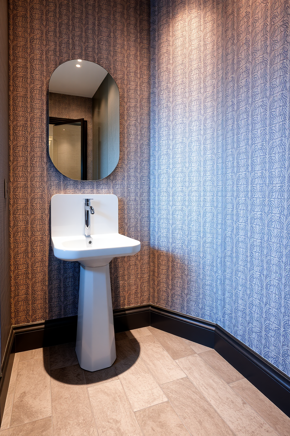 A stylish gray powder room featuring elegant gold accents. The walls are painted in a soft gray, complemented by a gold-framed mirror above a sleek gray vanity with a marble countertop. Gold fixtures and accessories add a touch of luxury, while a plush gray rug lies beneath a modern pedestal sink. A small potted plant on the vanity brings a hint of greenery to the sophisticated space.