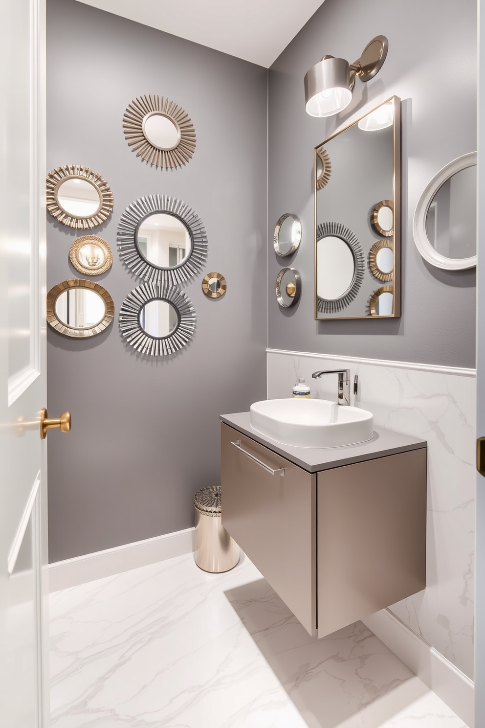 A stylish powder room featuring a gray accent wall adorned with decorative mirrors of varying sizes and shapes. The floor is tiled with elegant white marble, and a sleek floating vanity with a modern sink complements the overall design.