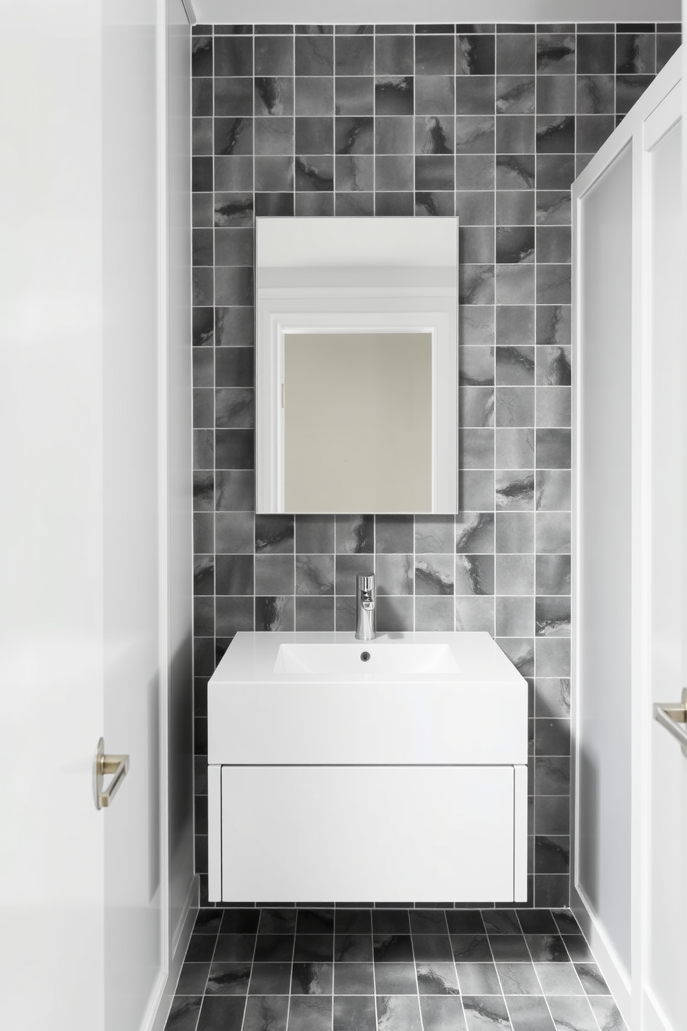 A chic powder room featuring soft gray wallpaper adorned with subtle geometric patterns. The space is complemented by a sleek white pedestal sink and a stylish round mirror with a brushed nickel frame.