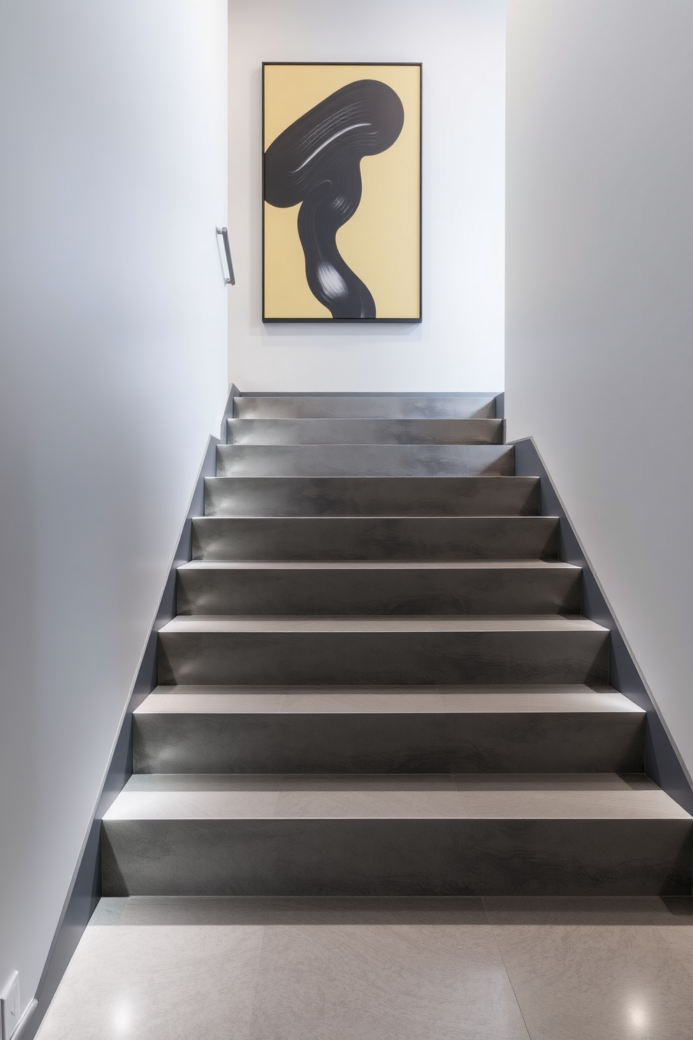 A stunning gray staircase featuring risers adorned with intricate artistic designs. The staircase is framed by sleek metal railings, complementing the modern aesthetic of the home.