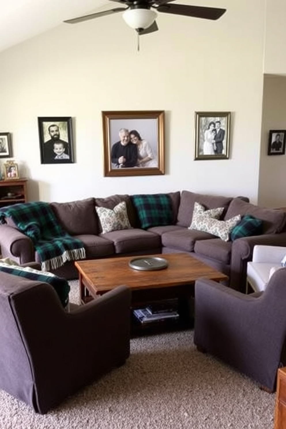 A cozy family room features classic green plaid throw blankets draped over a plush sectional sofa. The walls are adorned with framed family photos, and a rustic coffee table sits in the center, surrounded by comfortable armchairs.