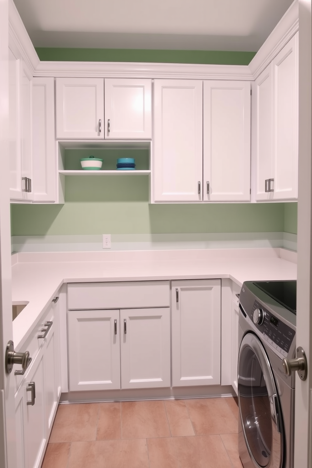 A classic laundry room featuring a pristine white cabinetry with green accents. The walls are painted in a soft green hue, complemented by white countertops and sleek stainless steel appliances.