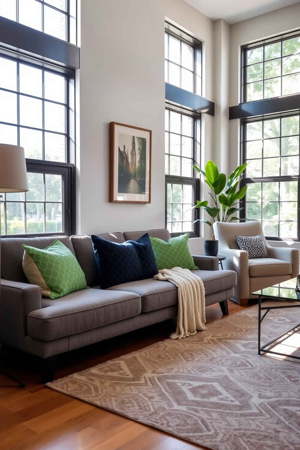 A stylish living room featuring a gray sofa adorned with vibrant green patterned cushions. The space is illuminated by natural light streaming through large windows, highlighting the carefully curated decor and inviting atmosphere.