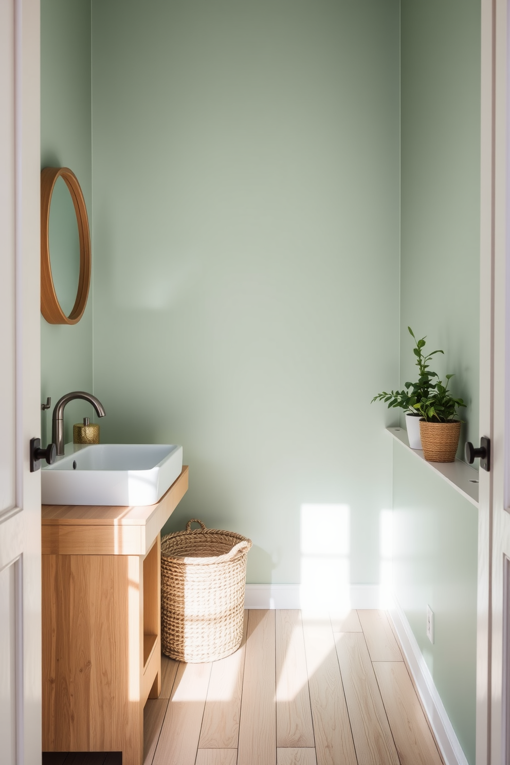 A stylish powder room featuring muted green walls adorned with vibrant artwork that adds a pop of color. The space includes a sleek white pedestal sink and a decorative mirror that reflects the artistic flair of the room.