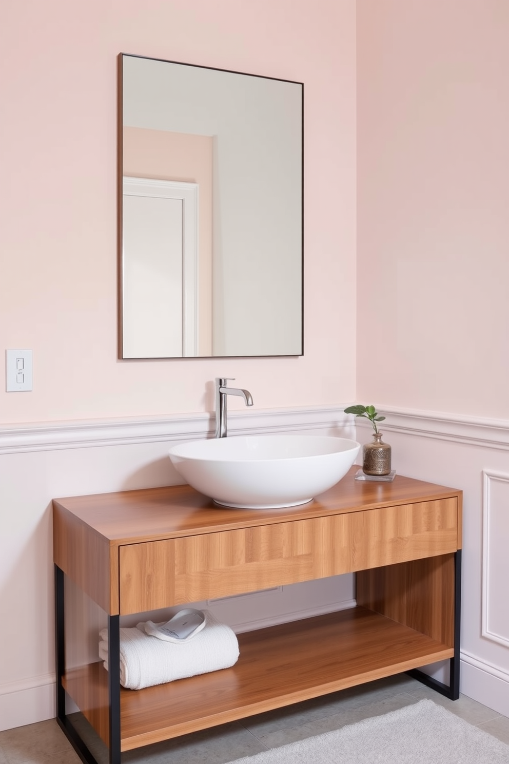 Chic vessel sink on a sleek console table. The console features clean lines and a warm wood finish, creating an inviting atmosphere. The walls are adorned with soft pastel colors, enhancing the light and airy feel of the space. Elegant accessories such as a decorative soap dispenser and a small potted plant complete the look.