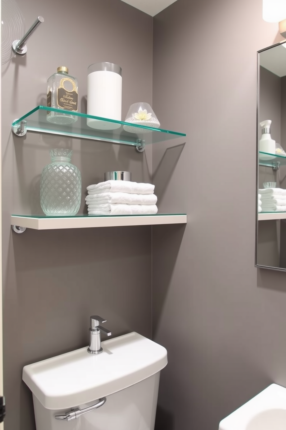 A stylish half bath featuring glass shelves for open storage. The shelves are elegantly arranged to showcase decorative items and neatly folded towels.