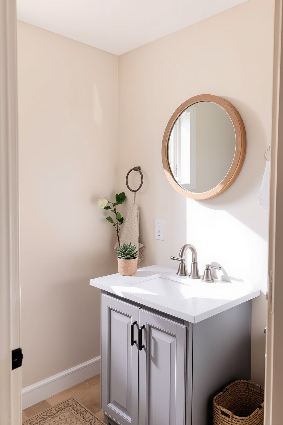 A serene half bathroom featuring a neutral color palette that promotes a calming atmosphere. The walls are painted in soft beige, complemented by a light gray vanity with a white quartz countertop. A round mirror with a simple wooden frame hangs above the vanity, reflecting natural light. Decorative elements include a small potted plant on the countertop and a woven basket for storage, enhancing the tranquil vibe.