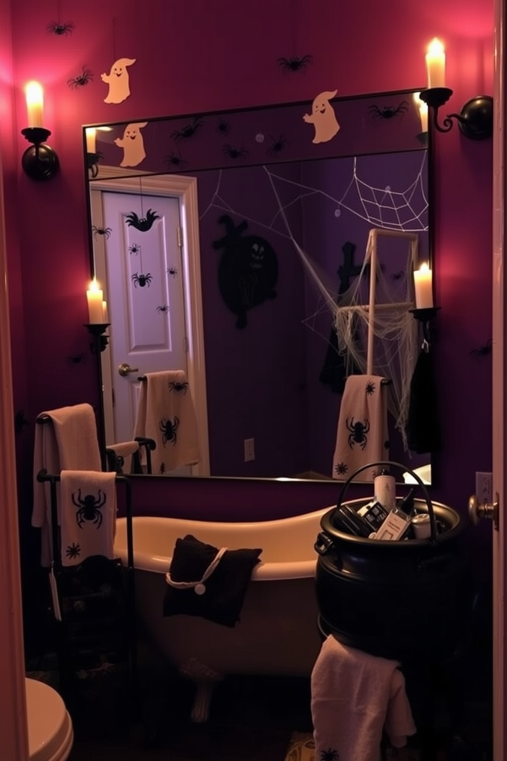 A haunted bathroom setting featuring a large mirror adorned with spooky decals and ghostly motifs. The walls are painted in deep purple, and flickering candle sconces cast eerie shadows throughout the space. A vintage clawfoot bathtub sits in the center, surrounded by cobwebs and faux spiders for a chilling effect. Halloween-themed towels hang from the rack, while a creepy cauldron filled with bath accessories adds to the festive decor.