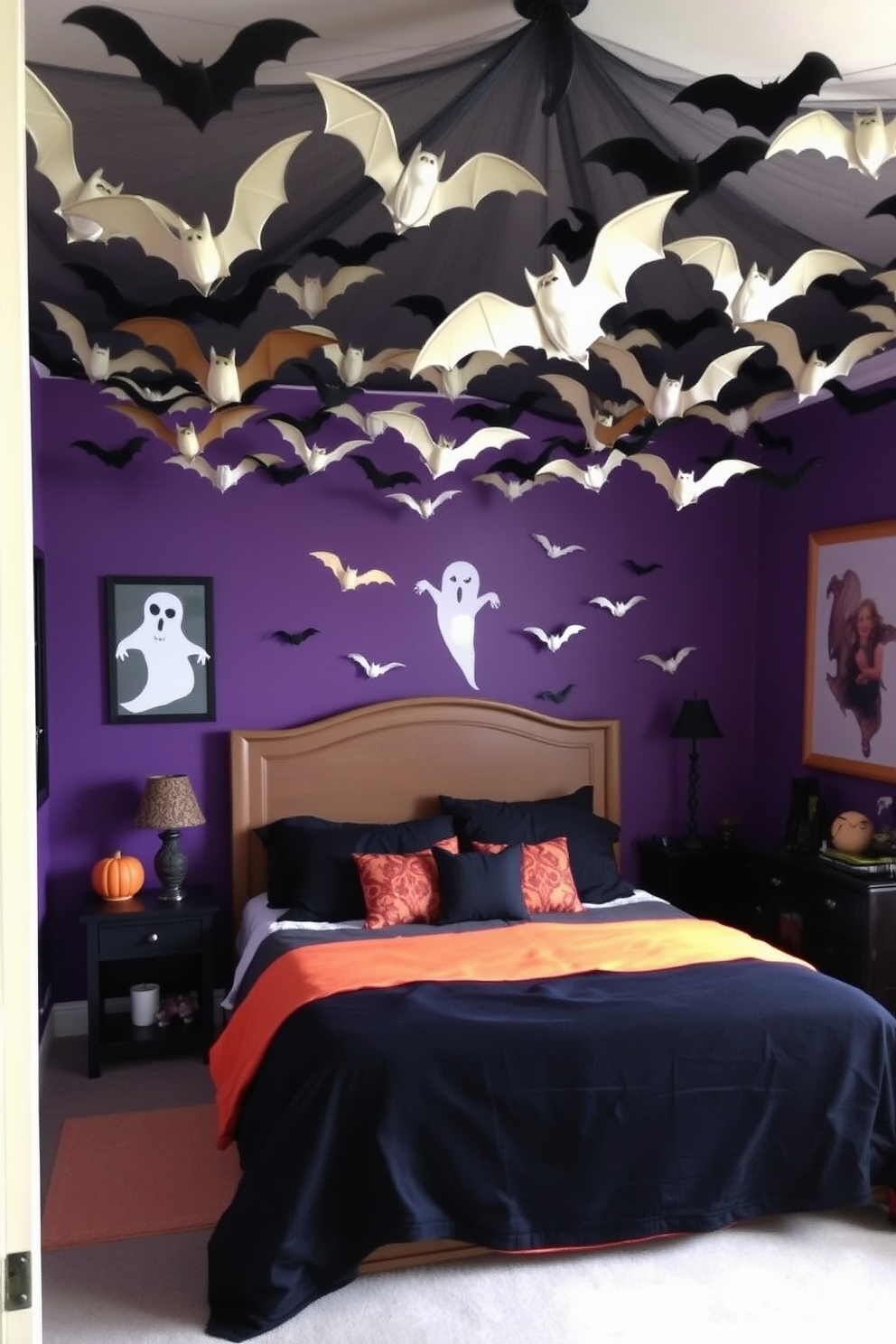 A whimsical Halloween bedroom setting featuring hanging bats from the ceiling to create a spooky atmosphere. The walls are painted in deep purple and adorned with ghostly wall art, while a cozy bed is dressed in black and orange linens.