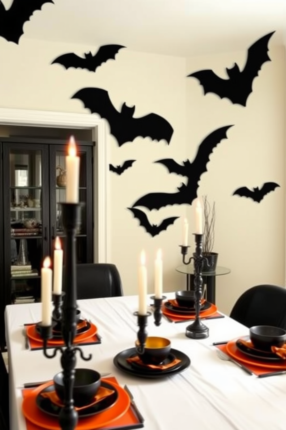 A dining room adorned with bat silhouette wall hangings creates a spooky yet stylish atmosphere for Halloween. The table is set with black and orange tableware, and eerie candle holders cast flickering shadows across the room.