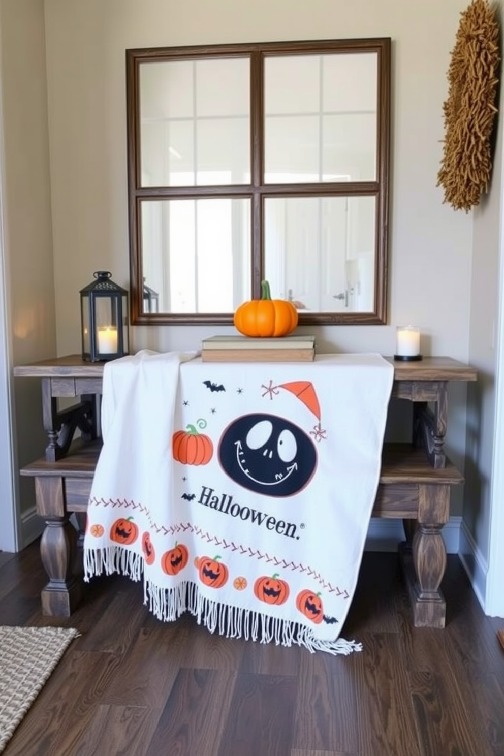 A cozy entryway featuring a seasonal throw blanket adorned with a playful Halloween print. The blanket is draped over a rustic wooden bench, complemented by a small pumpkin centerpiece and flickering candle lanterns.