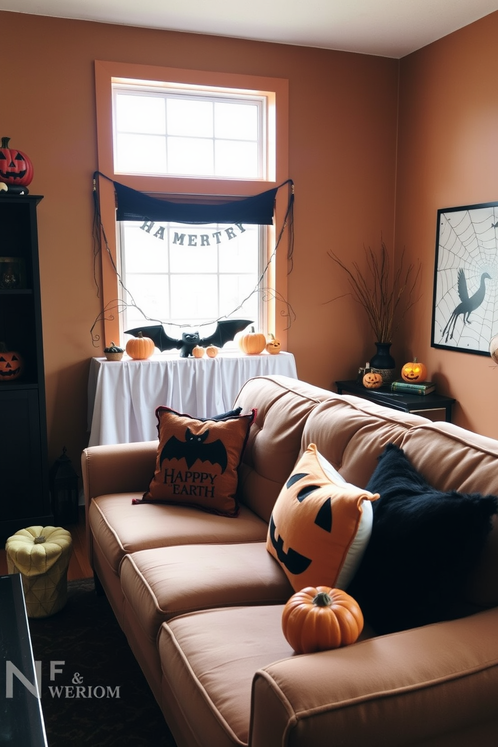 A cozy loft living room decorated for Halloween features a plush sofa adorned with black and orange throw pillows that add a festive touch. The walls are painted in a warm neutral tone, and soft lighting creates an inviting atmosphere, highlighting seasonal decorations like carved pumpkins and spooky artwork.