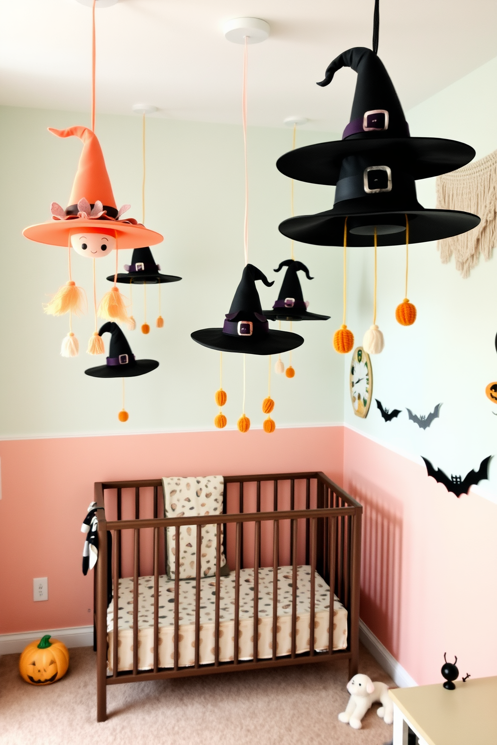 A whimsical nursery adorned with cute witch hat mobiles hanging from the ceiling. The walls are painted in soft pastel colors, and a cozy crib sits in the corner, surrounded by playful Halloween-themed decorations.