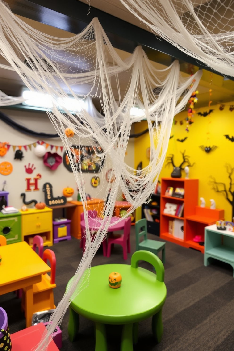 A playful Halloween-themed playroom filled with whimsical decorations. Faux cobwebs are draped over colorful furniture, creating a spooky yet fun atmosphere for children.