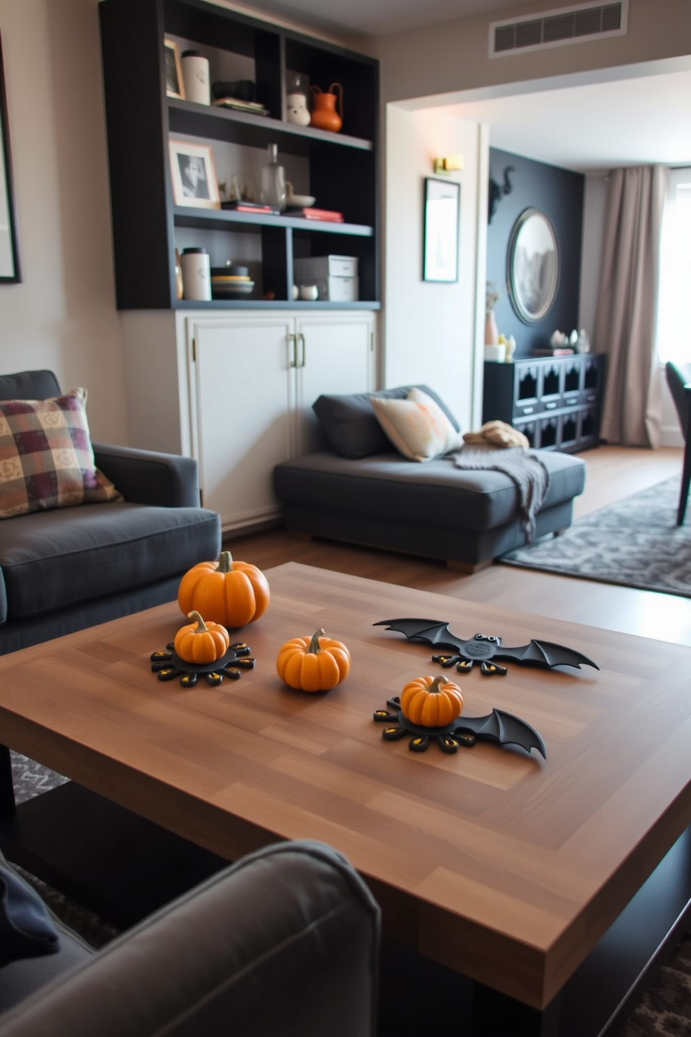 A cozy living room featuring a coffee table adorned with bat-shaped coasters. The space is decorated with subtle Halloween accents like miniature pumpkins and ghostly decor, creating a festive yet stylish atmosphere. A compact apartment living area showcasing innovative small space decorating ideas. Clever storage solutions blend seamlessly with decorative elements, maximizing functionality without sacrificing aesthetic appeal.