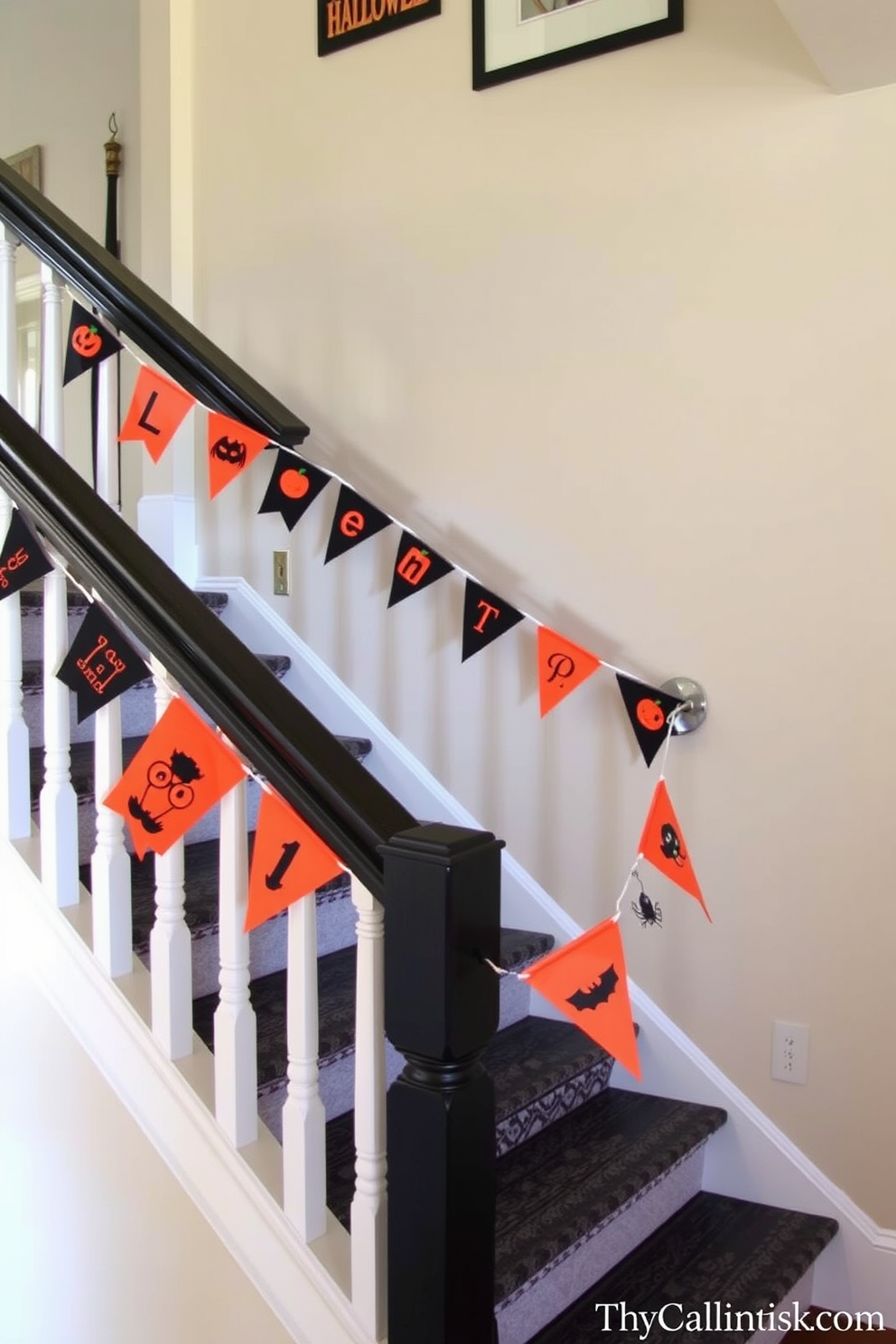 A whimsical staircase adorned with DIY Halloween banners strung across the rails. The banners feature playful designs in orange and black, creating a festive atmosphere that welcomes guests.