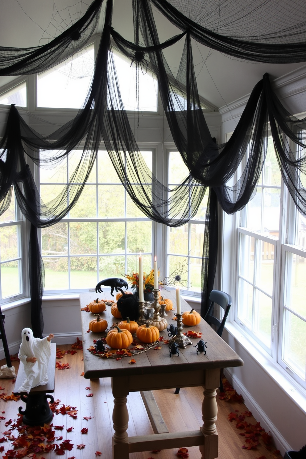 A beautifully arranged pumpkin centerpiece sits on a rustic wooden coffee table in a sunlit sunroom. The table is surrounded by comfortable seating adorned with cozy throw pillows, creating a warm and inviting atmosphere for Halloween festivities.