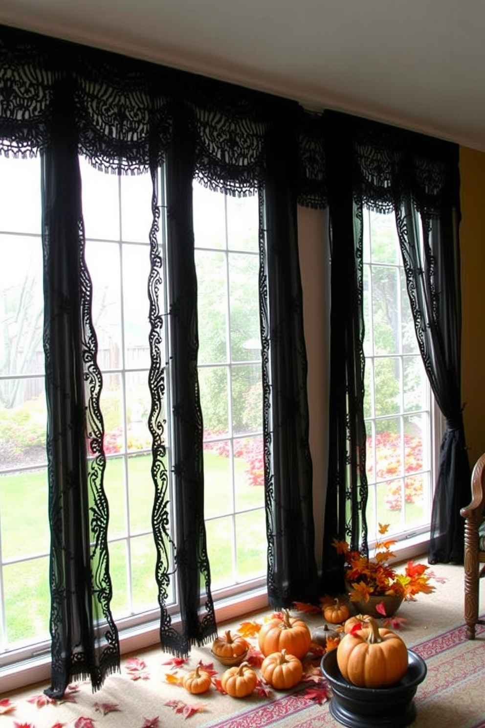 A sunroom filled with natural light features black lace curtains that drape elegantly from the ceiling to the floor, creating a dramatic effect. The space is adorned with autumn-themed decorations, including small pumpkins and vibrant fall leaves, enhancing the Halloween spirit.