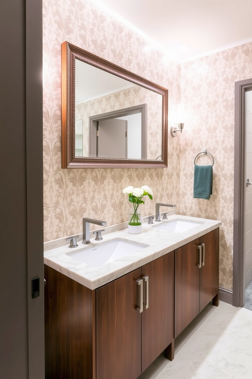 A stylish hallway bathroom featuring dual sinks for shared convenience. The design includes a sleek wooden vanity with a polished stone countertop and modern fixtures. The walls are adorned with elegant wallpaper in a soft neutral tone. A large framed mirror hangs above the sinks, enhancing the sense of space and light.