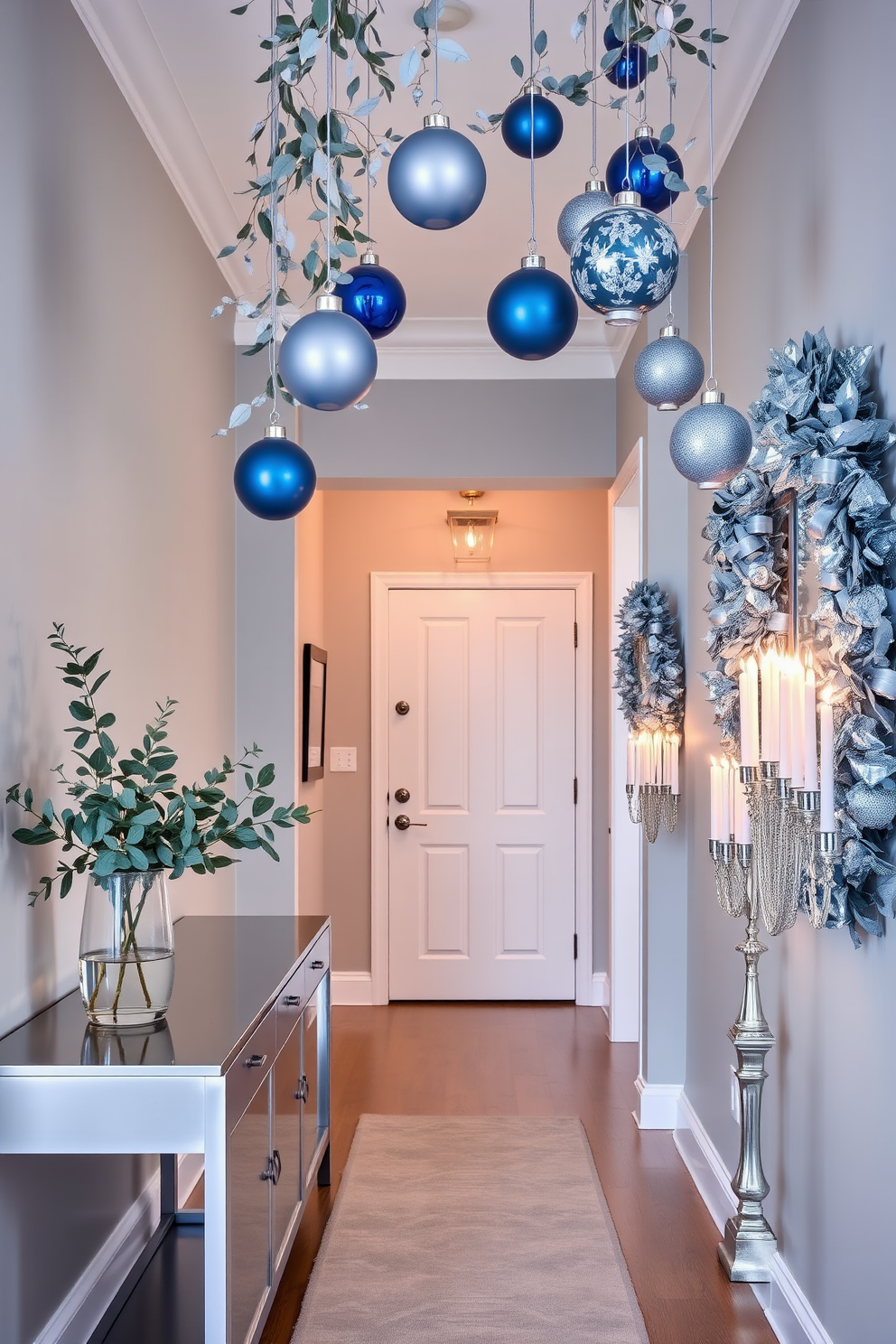 A serene hallway adorned with eucalyptus and silver accents. The walls are painted in a soft gray tone, and a long console table with a silver finish runs along one side, topped with a stylish arrangement of eucalyptus branches in a sleek vase. For Hanukkah, the hallway is decorated with elegant blue and silver ornaments hanging from the ceiling. A series of menorahs line the console table, each illuminated with flickering candles, creating a warm and inviting atmosphere.