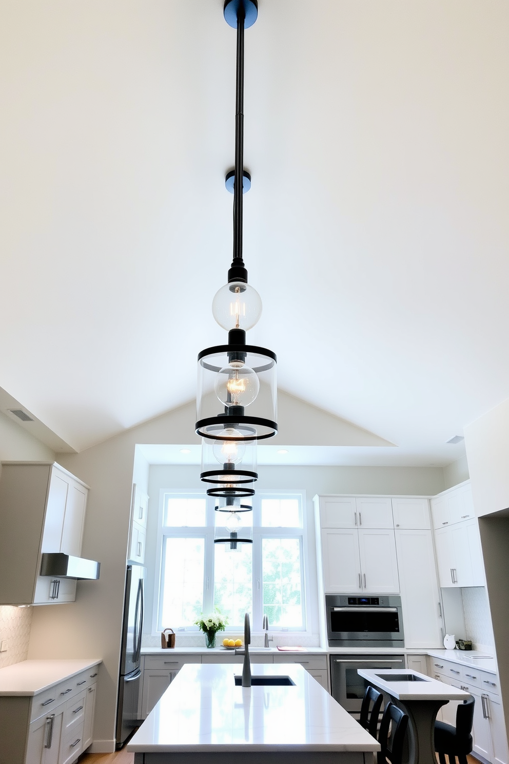 A high ceiling kitchen features elegant pendant lights installed at varying heights to create a dynamic visual effect. The space is filled with natural light, highlighting the sleek cabinetry and spacious island that invites gatherings.