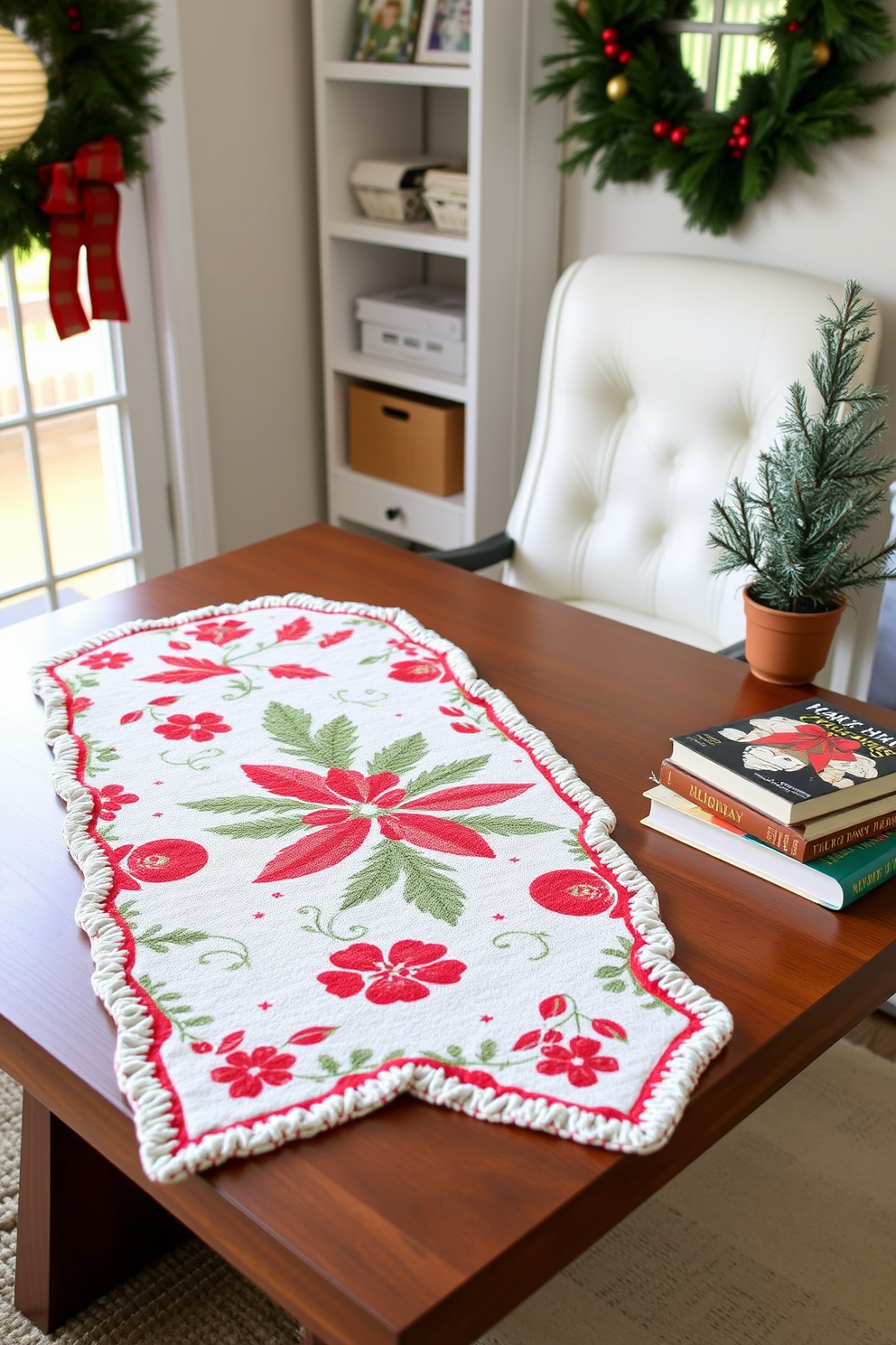 A cozy home office setting adorned for Christmas. A seasonal table runner featuring festive colors and patterns is placed on a sleek wooden desk, complemented by a small potted evergreen and a stack of holiday-themed books.