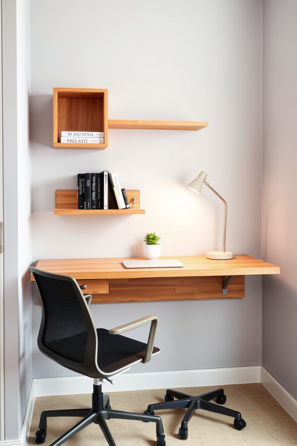 A sleek wall-mounted desk designed for small spaces features a minimalist aesthetic with clean lines and a natural wood finish. Above the desk, floating shelves provide additional storage for books and office supplies, while a stylish task lamp illuminates the workspace. The walls are painted in a soft gray to enhance the sense of openness, and a comfortable ergonomic chair complements the desk design. A small potted plant adds a touch of greenery, creating a calming and productive home office environment.