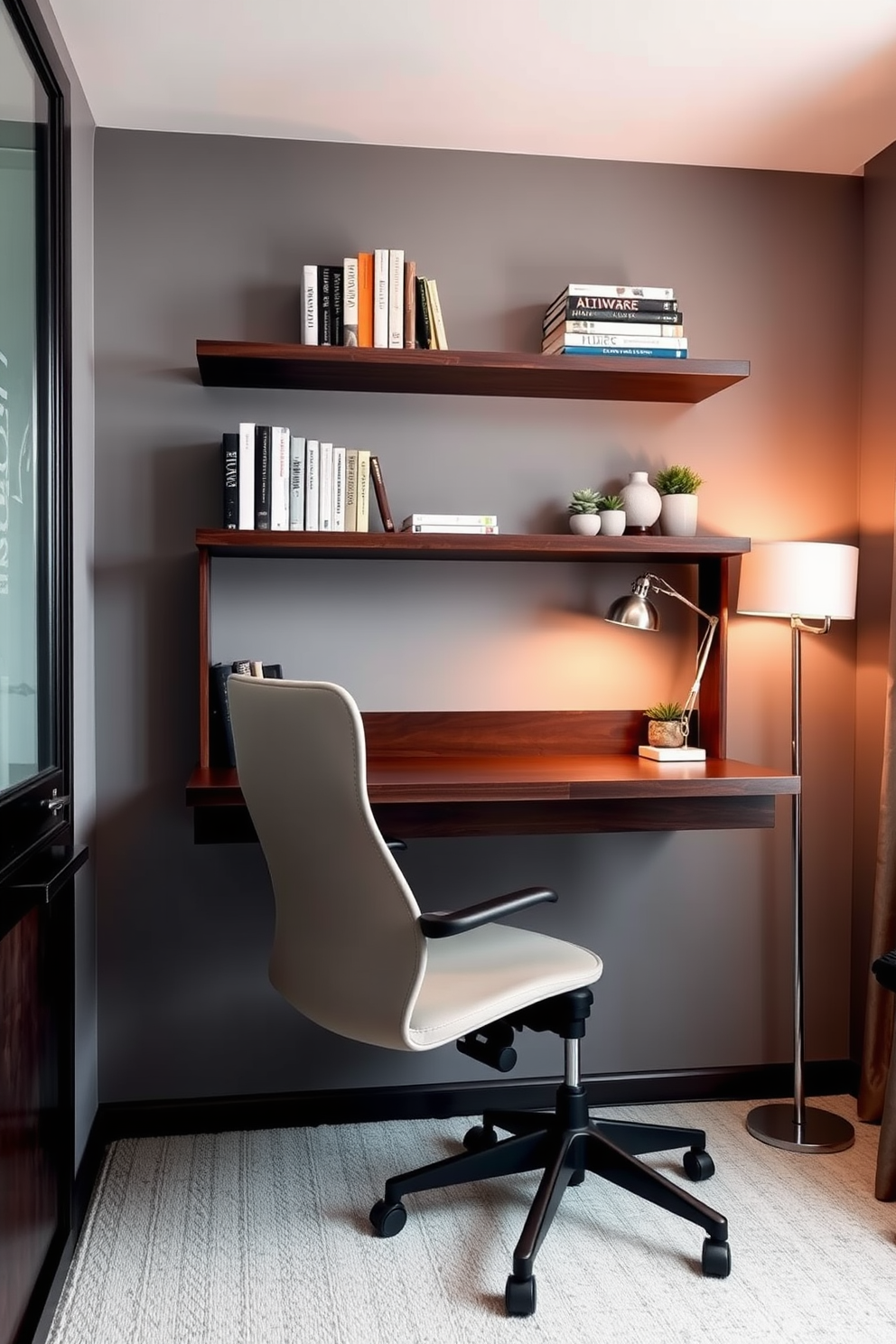 A modern home office featuring a sleek wall-mounted desk made of dark wood. Above the desk, open shelving displays books and decorative items, while a comfortable ergonomic chair is positioned underneath. The walls are painted in a soft gray tone, creating a calm atmosphere. A stylish desk lamp and a potted plant add a touch of personality to the workspace.