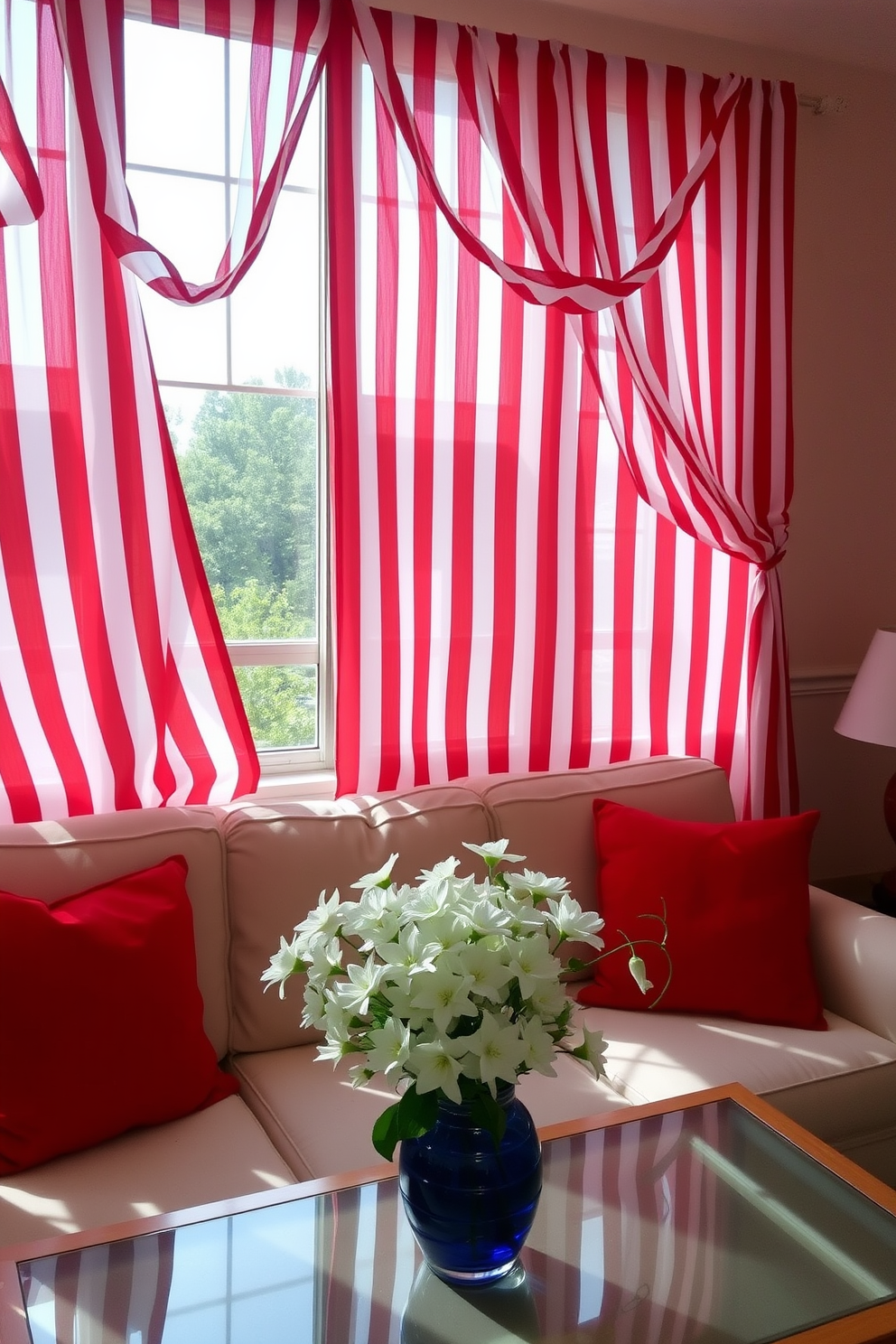 A festive apartment setting adorned with red and white striped curtains that billow gently in the breeze. The curtains frame large windows, allowing natural light to illuminate the space while adding a vibrant touch to the Independence Day decor. Bright red throw pillows are scattered across a cream-colored sofa, complementing the curtains beautifully. A centerpiece of white flowers in a blue vase sits on the coffee table, enhancing the patriotic theme while creating a welcoming atmosphere.