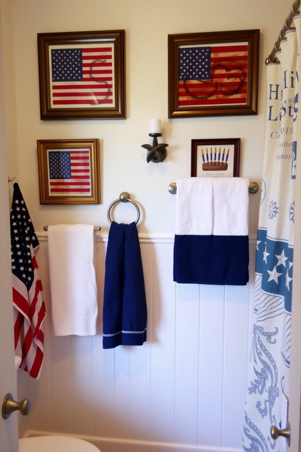 A charming bathroom decorated for Independence Day features vintage American flag framed prints adorning the walls. The space is enhanced by red, white, and blue accents, including towels and a decorative shower curtain, creating a festive yet elegant atmosphere.