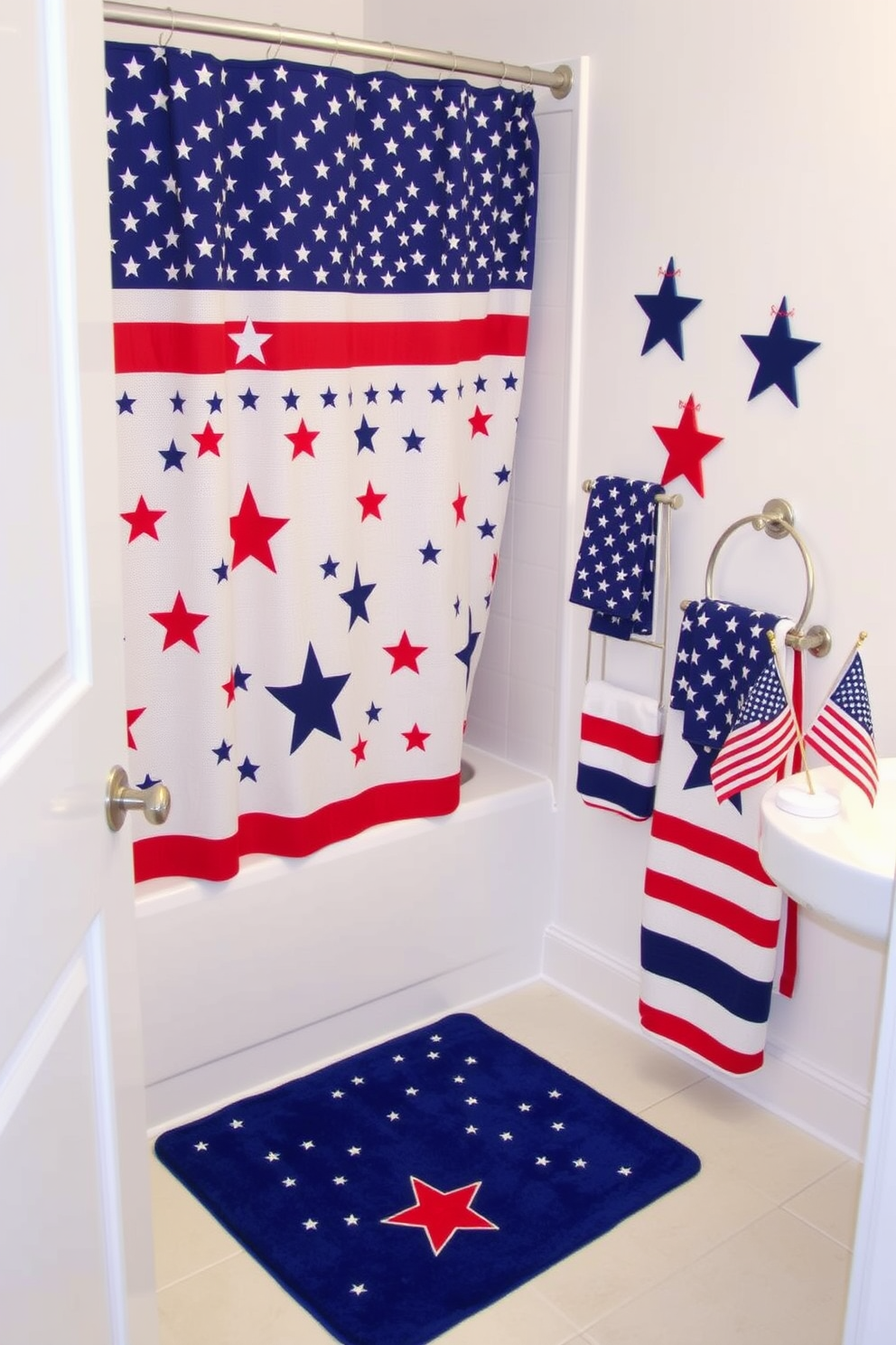 A festive bathroom setting celebrating Independence Day. Themed bath accessories feature stars and stripes, including a shower curtain, bath mat, and towels in red, white, and blue. A decorative star-shaped soap dispenser sits on the countertop next to a matching toothbrush holder. The walls are adorned with patriotic artwork, and a small American flag is placed on the vanity for an added touch.