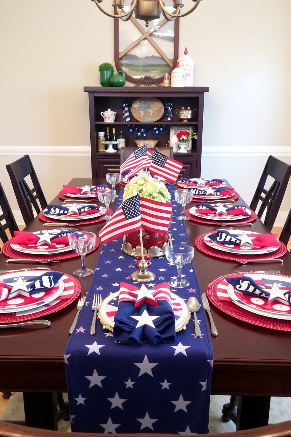 A festive dining table is set with vibrant tableware featuring red white and blue flag designs. The table is adorned with star-shaped napkin holders and small American flags as centerpieces.