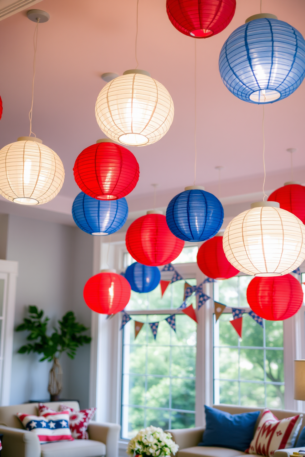 A festive living room adorned with hanging paper lanterns in red, white, and blue. The lanterns are suspended from the ceiling, creating a vibrant atmosphere that celebrates Independence Day.