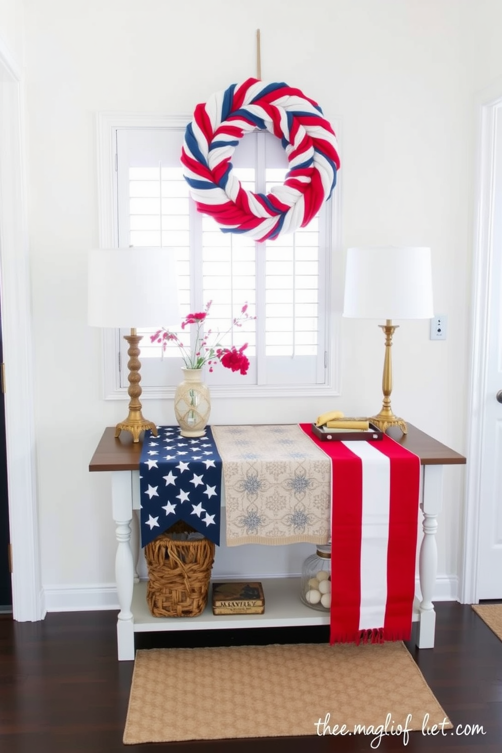 A stylish entryway featuring a console table adorned with a stars and stripes table runner. The walls are painted in a soft white hue, and a vibrant red, white, and blue wreath hangs above the table.