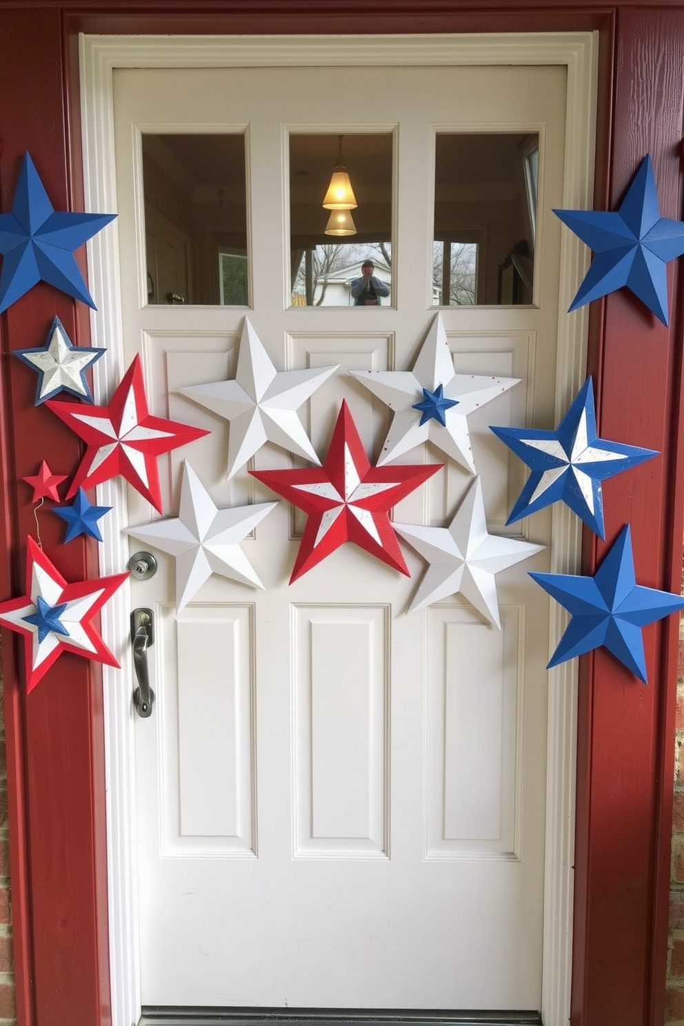 Create a festive front door display for Independence Day featuring sparkling star door decals. The door is adorned with red white and blue decorations and a welcoming wreath that complements the star decals.