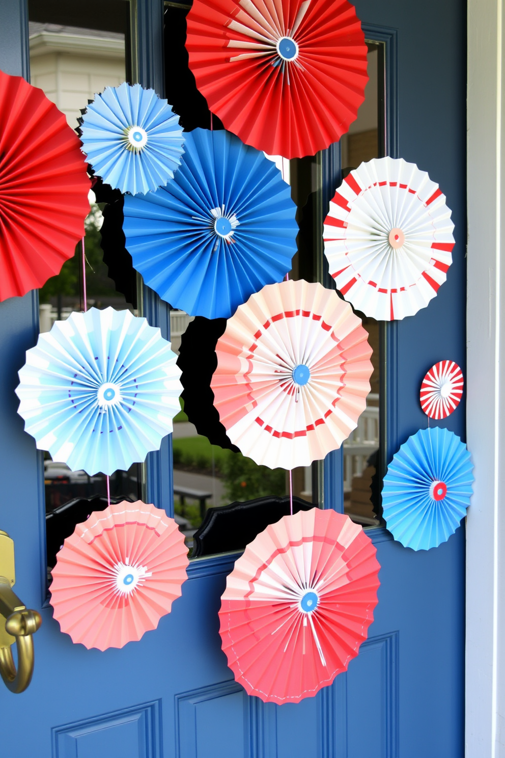 A festive front door adorned with hanging red white and blue paper fans celebrating Independence Day. The paper fans are arranged in a visually pleasing pattern, creating a vibrant and welcoming display for guests.