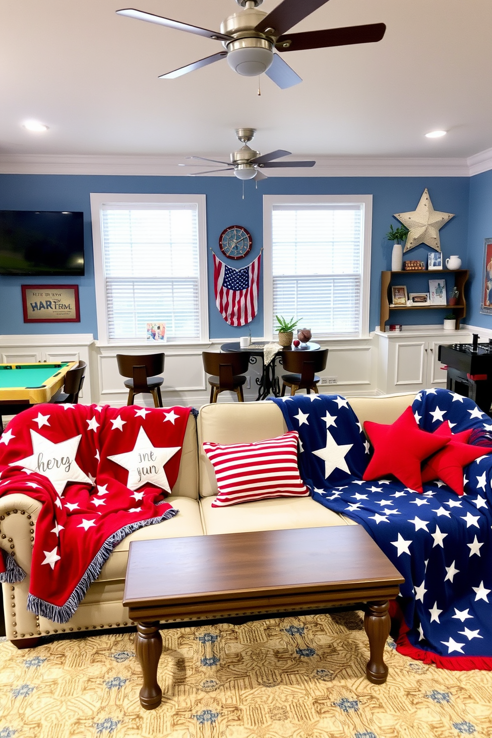 A vibrant game room adorned with star and stripe patterned blankets draped over plush sofas. The space is filled with playful decor elements celebrating Independence Day, including red, white, and blue accents throughout the room.