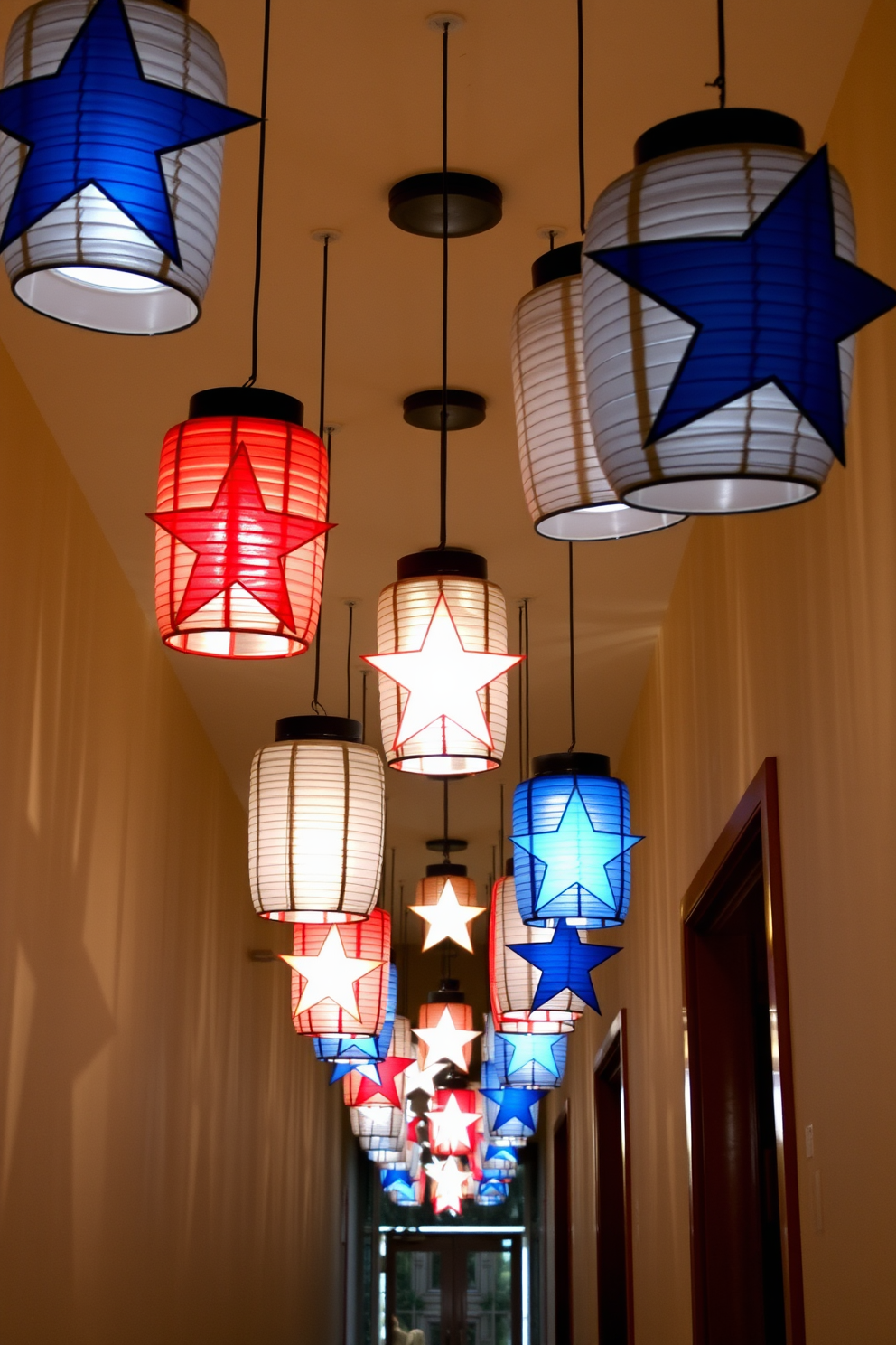 Hanging lanterns adorned with star cutouts illuminate the hallway, creating a festive atmosphere for Independence Day celebrations. The lanterns are suspended at varying heights, casting playful shadows on the walls and enhancing the patriotic decor.