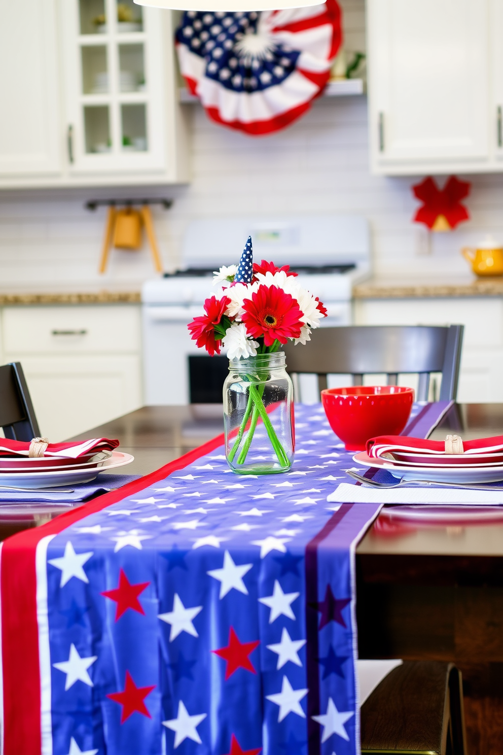 A festive kitchen setting for Independence Day. The table is adorned with a stars and stripes table runner, creating a vibrant focal point for the celebration. Red, white, and blue dishes are neatly arranged on the table, complemented by matching napkins. Fresh flowers in a mason jar add a touch of charm to the patriotic decor.