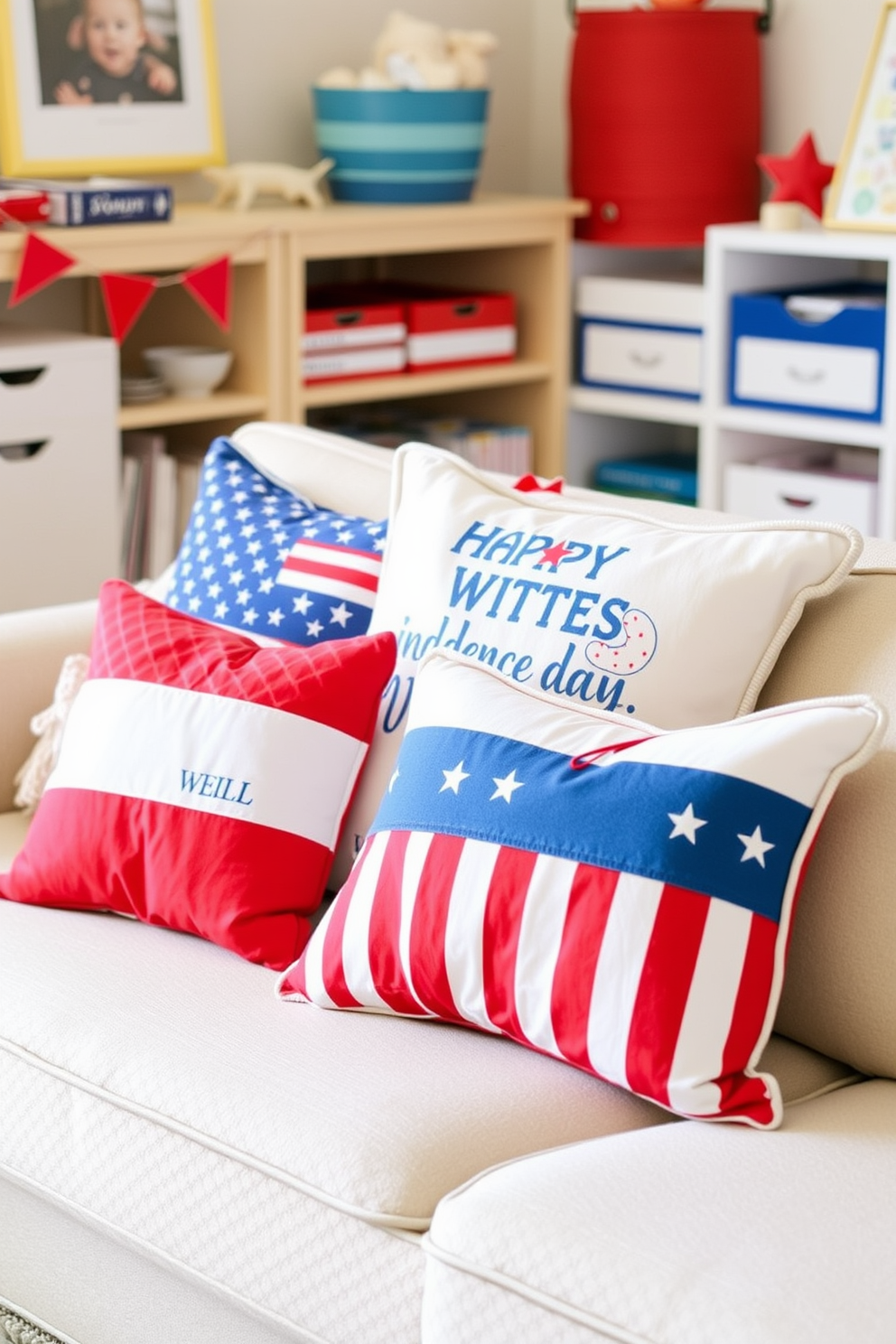 Decorative red white and blue pillows are arranged on a cozy playroom sofa to celebrate Independence Day. The pillows feature various patterns including stars and stripes, adding a festive touch to the playful atmosphere.