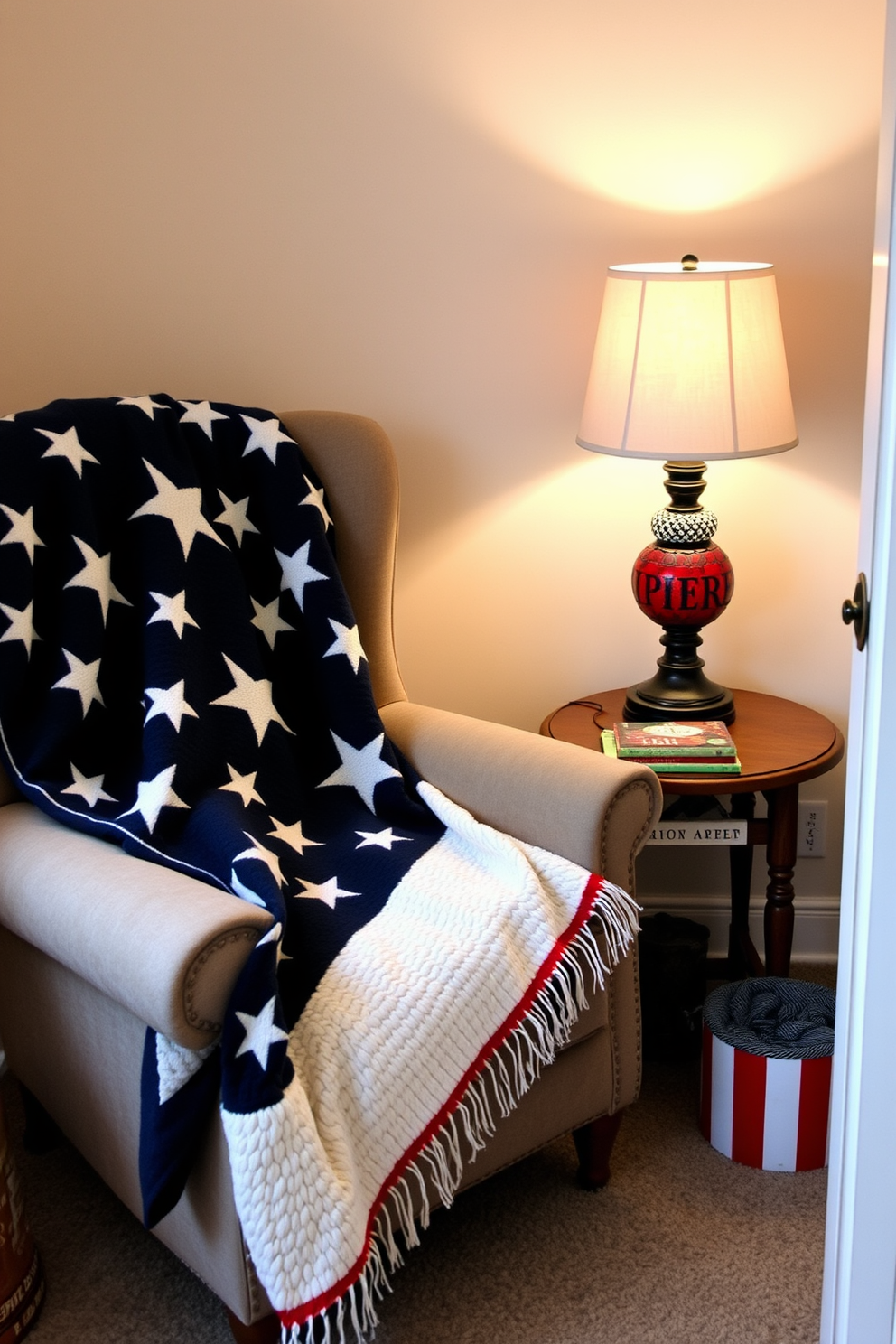 A cozy reading nook adorned with a stars and stripes blanket draped over a plush armchair. The nook features a small wooden side table with a stack of books and a patriotic-themed lamp casting a warm glow.