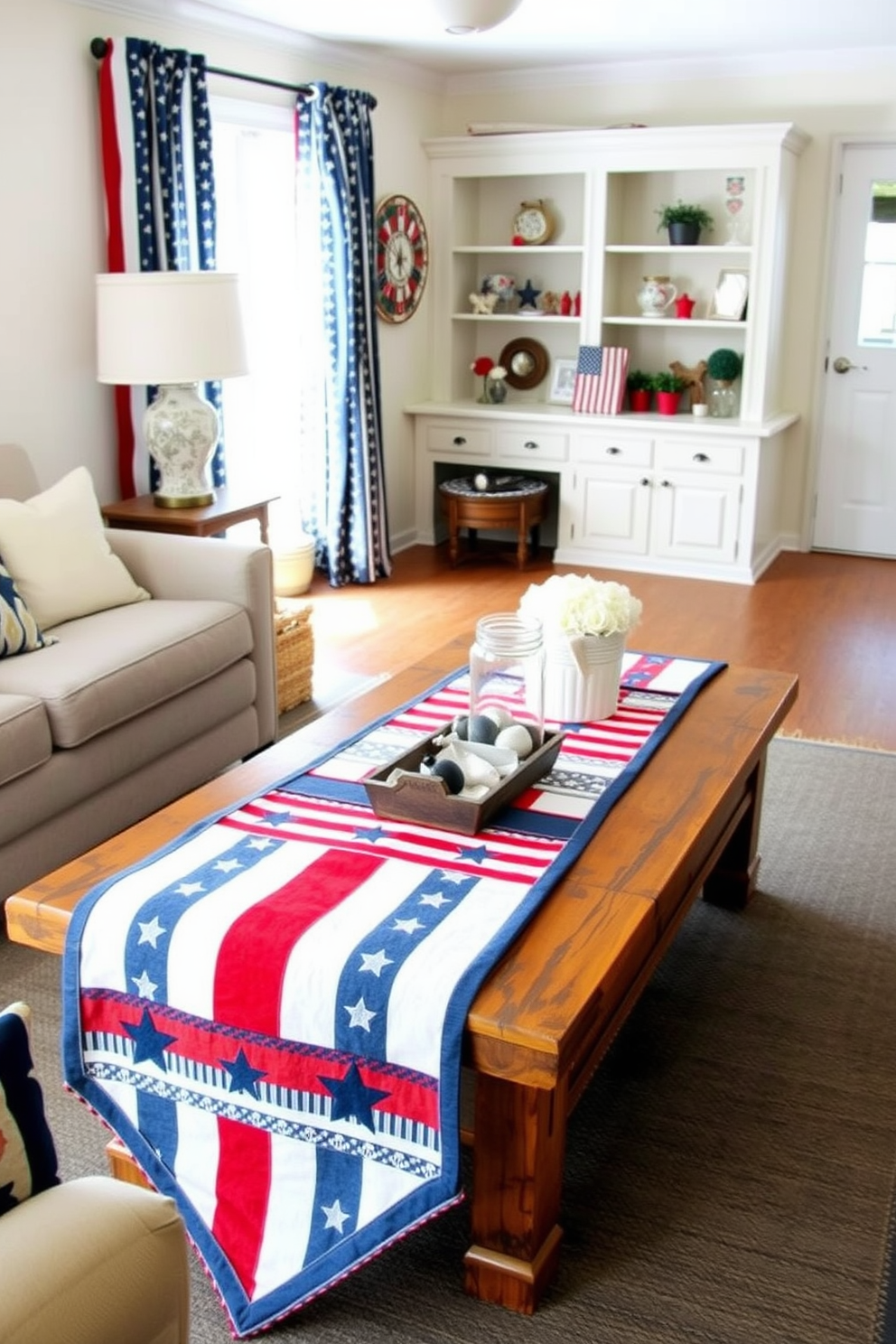 A cozy small living room decorated for Independence Day features a patriotic banner draped across the mantle. The mantle is adorned with red white and blue accents including candles and small flags to enhance the festive atmosphere.