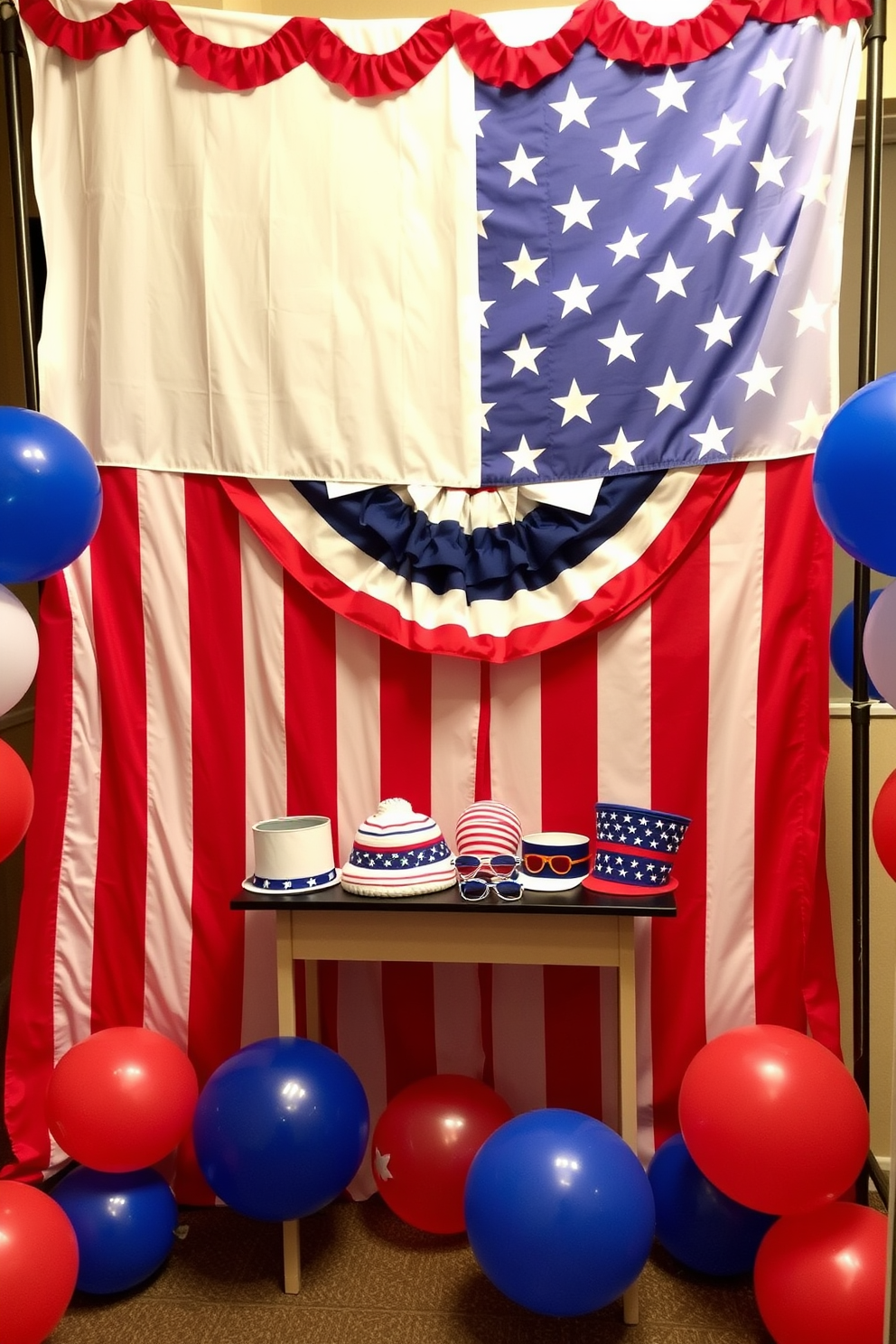 A vibrant patriotic themed photo booth corner designed for Independence Day. The backdrop features a large American flag with red white and blue bunting draped across the top. In the corner, a small table is adorned with themed props such as hats and sunglasses in national colors. Colorful balloons are scattered around the space to enhance the festive atmosphere.